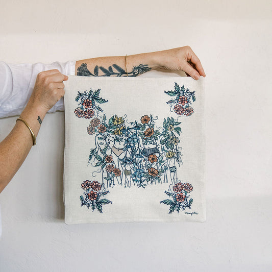 natural linen pillow cover featuring hand-drawn feminine figures blooming among watercolor wildflowers. botanical home decor by tucson artist marcy ellis.