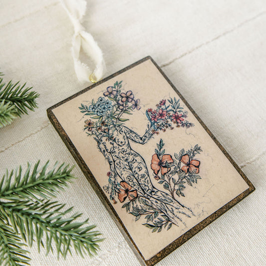 offerings of love wooden holiday ornament, botanical artwork on dark stained wood with gold eye screw and ribbon
