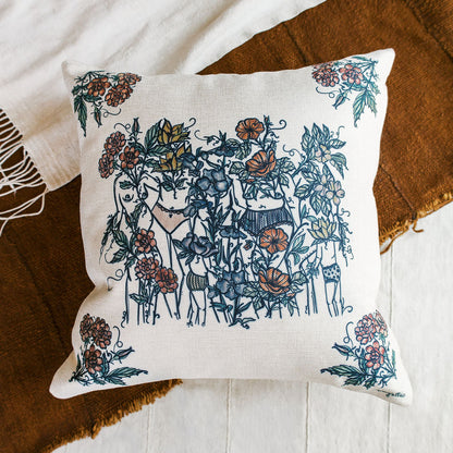 natural linen pillow cover featuring hand-drawn feminine figures blooming among watercolor wildflowers. botanical home decor by tucson artist marcy ellis.