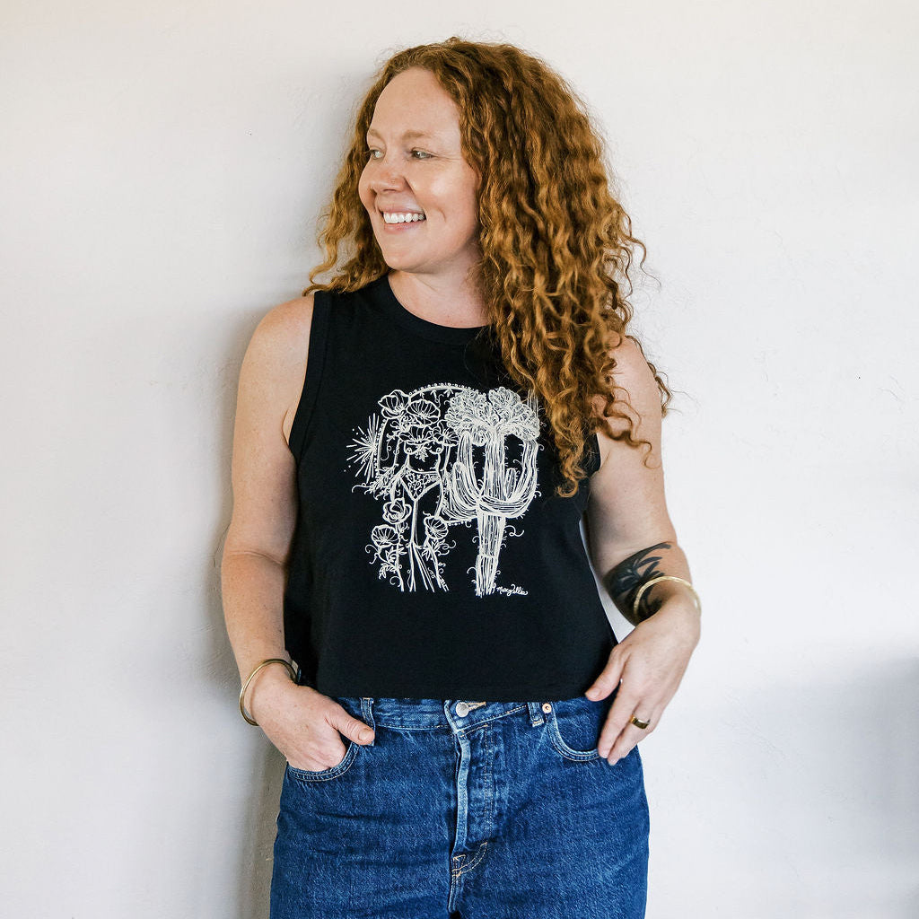 Marcy Ellis wearing crested saguaro sister screen printed black crop tank with ivory ink illustration by marcy ellis