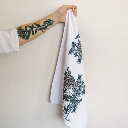white waffle weave dish towel with botanical figures by Marcy Ellis 