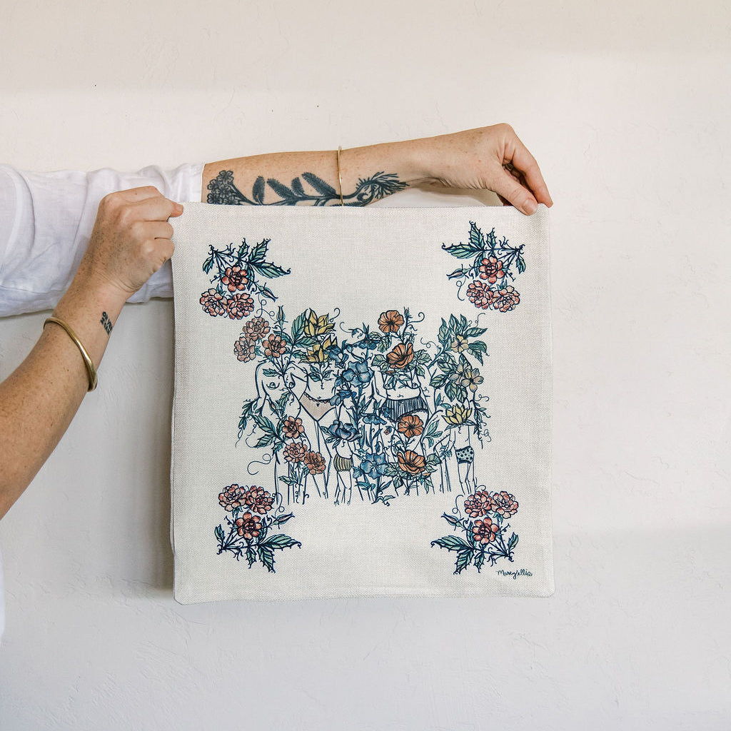 natural linen pillow cover featuring hand-drawn feminine figures blooming among watercolor wildflowers. botanical home decor by tucson artist marcy ellis.