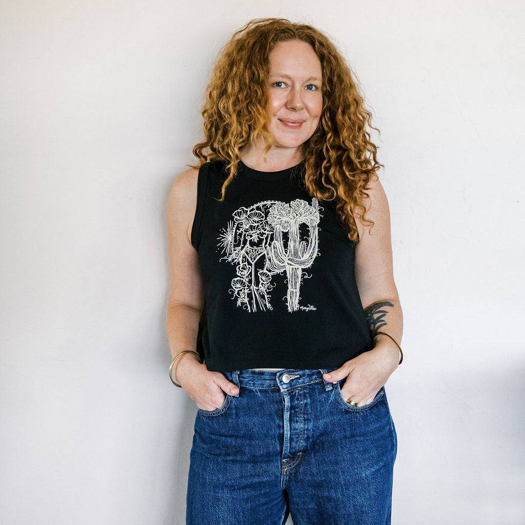 Marcy Ellis wearing crested saguaro sister screen printed black crop tank with ivory ink illustration by marcy ellis