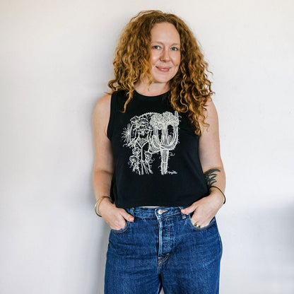 Marcy Ellis wearing crested saguaro sister screen printed black crop tank with ivory ink illustration by marcy ellis