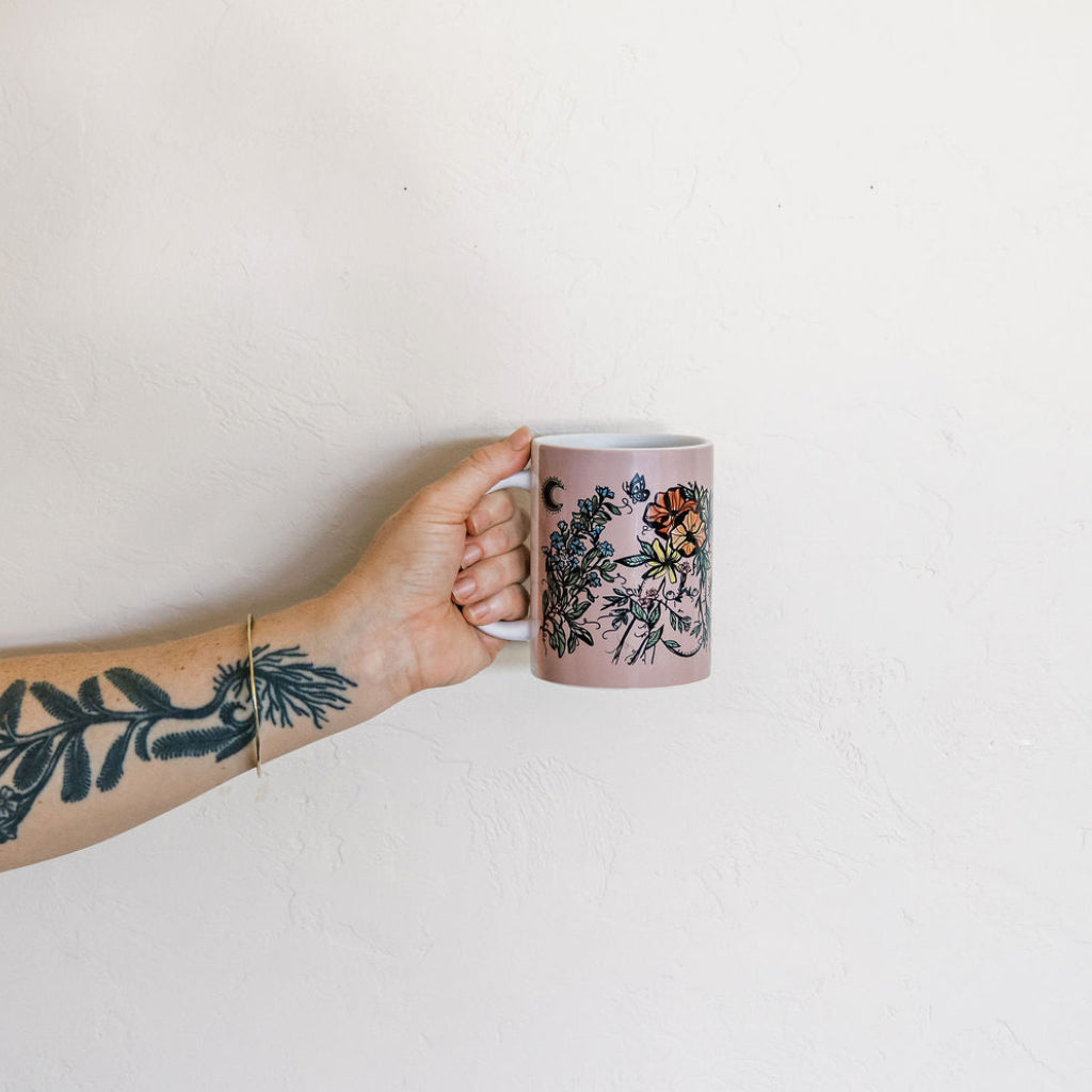 Marcy Ellis ceramic 15oz mug with botanical floral figures in purple ink. 