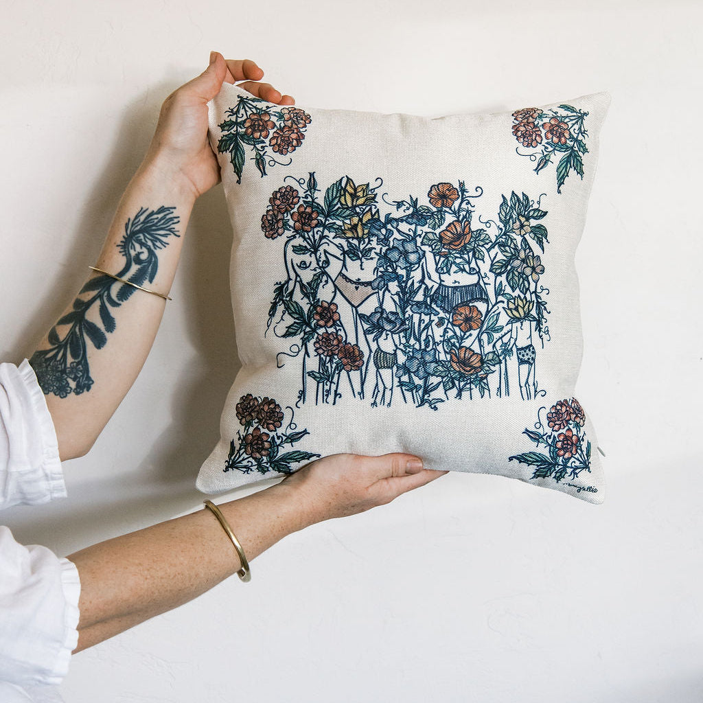 natural linen pillow cover featuring hand-drawn feminine figures blooming among watercolor wildflowers. botanical home decor by tucson artist marcy ellis.