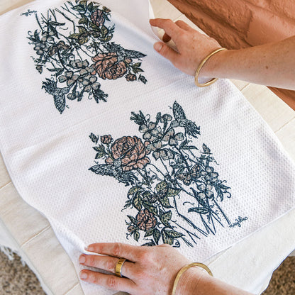 flat white waffle weave dish towel with Marcy Ellis botanical feminine artistic design 