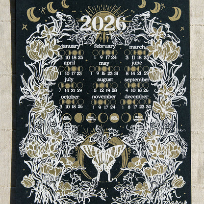 2026 calendar with floral and celestial design on a black background