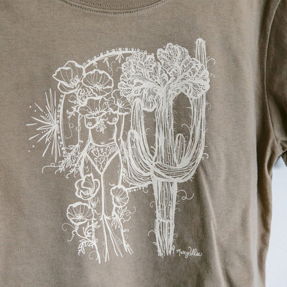 close up detail of a sand boxy crop tee hand screen printed with an ivory crested saguaro and botanical figure design by marcy ellis