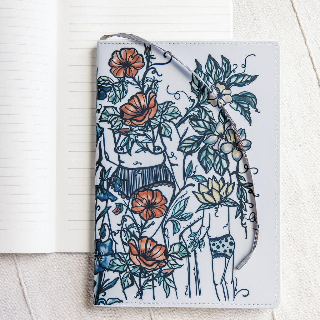 a5 lined journal with watercolor feminine botanical figures wrapping the front and back covers. 190 pages, faux leather cover. hand-painted design by artist Marcy Ellis in Tucson, AZ.