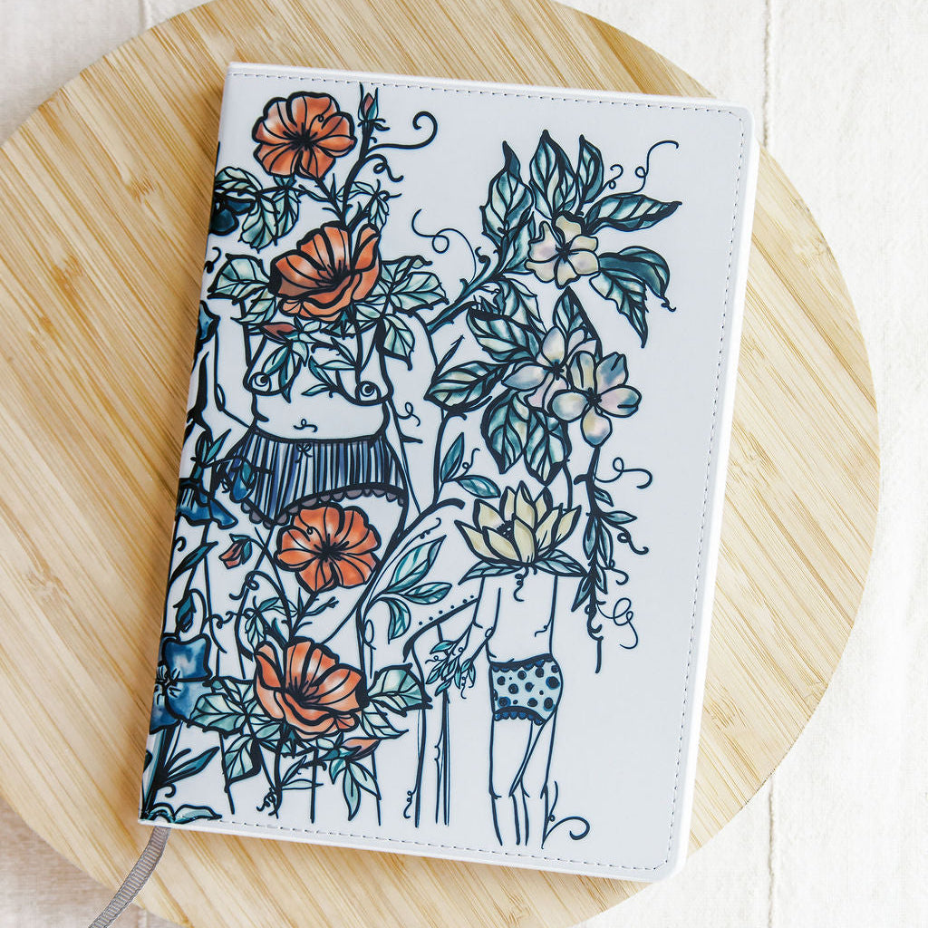 a5 lined journal with watercolor feminine botanical figures wrapping the front and back covers. 190 pages, faux leather cover. hand-painted design by artist Marcy Ellis in Tucson, AZ.