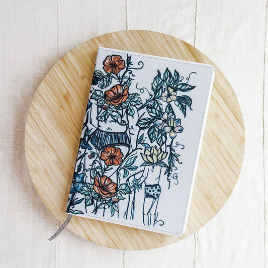 a5 lined journal with watercolor feminine botanical figures wrapping the front and back covers. 190 pages, faux leather cover. hand-painted design by artist Marcy Ellis in Tucson, AZ.