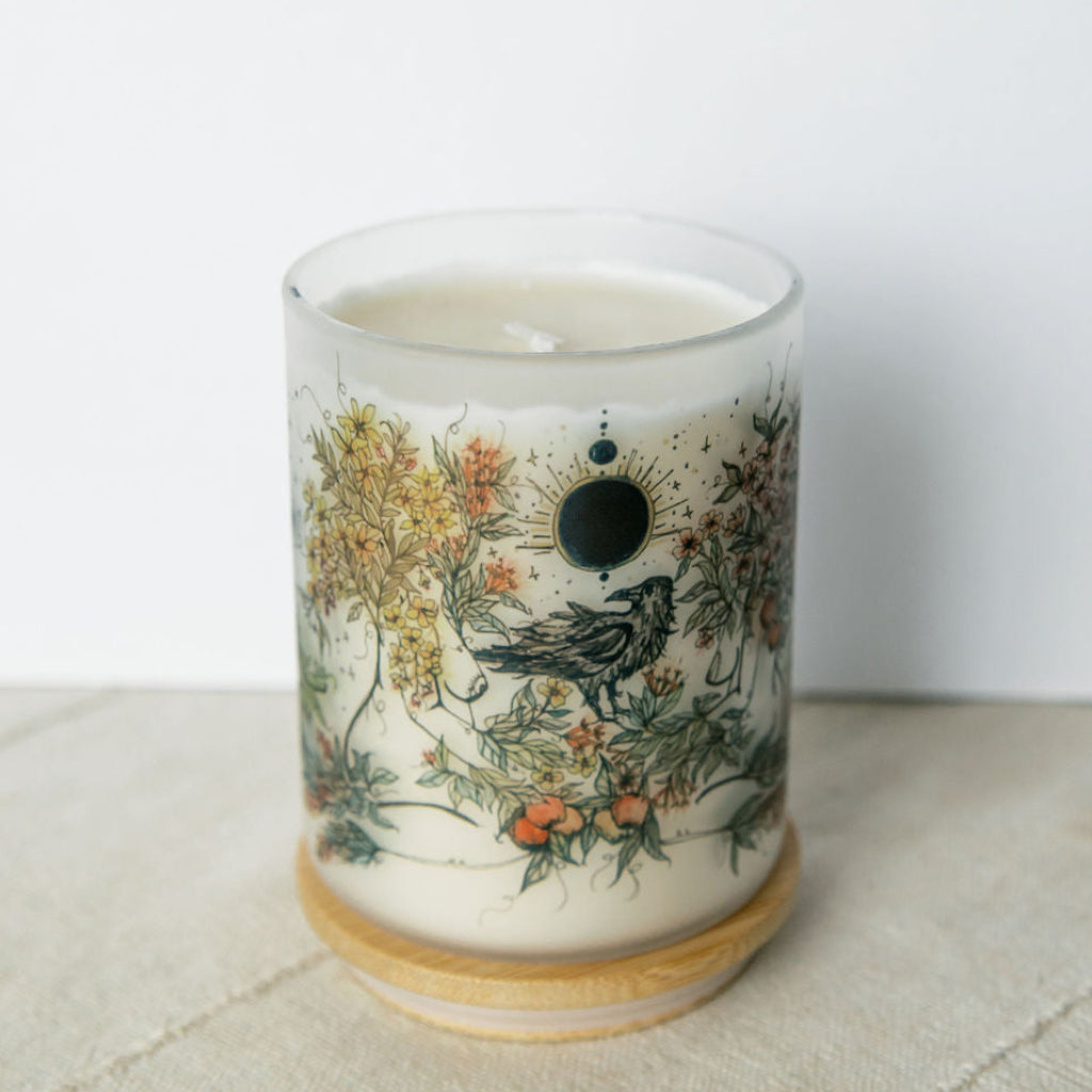 mabon fall equinox soy candle with botanical artwork wrapped around frosted glass jar