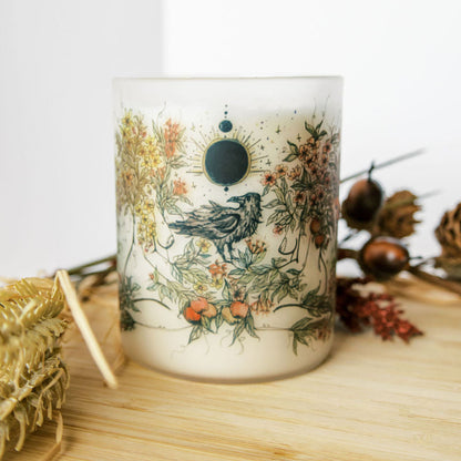 mabon fall equinox soy candle with botanical artwork wrapped around frosted glass jar
